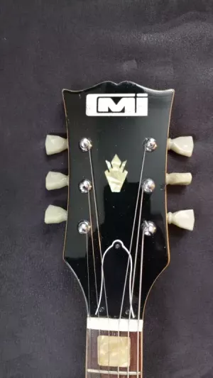 La tête d'une CMI SG avec son logo.